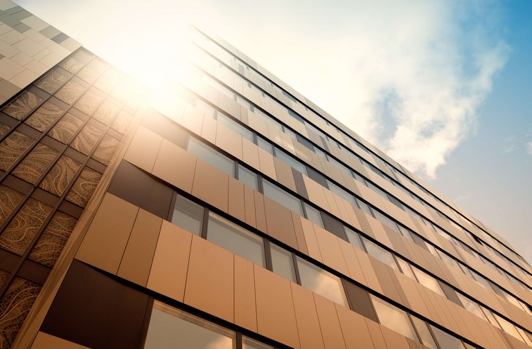 Powder Coated, brown facade at dusk