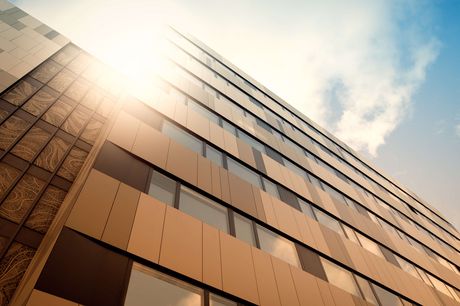 Powder Coated, brown facade at dusk